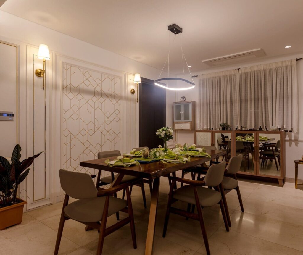 Spacious dining area interior design with modern finishes in Panchshil Towers